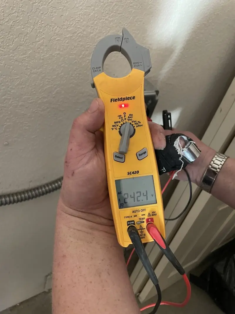 Voltage testing with clamp meter during Ceiling Fan Installation in Carneys Point